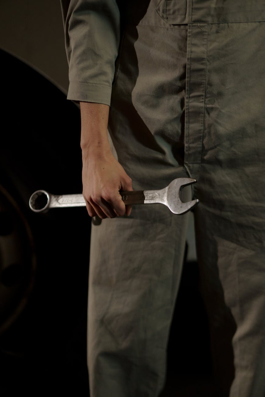 Experienced tradesperson in a workshop — the generation of HVAC owners approaching retirement