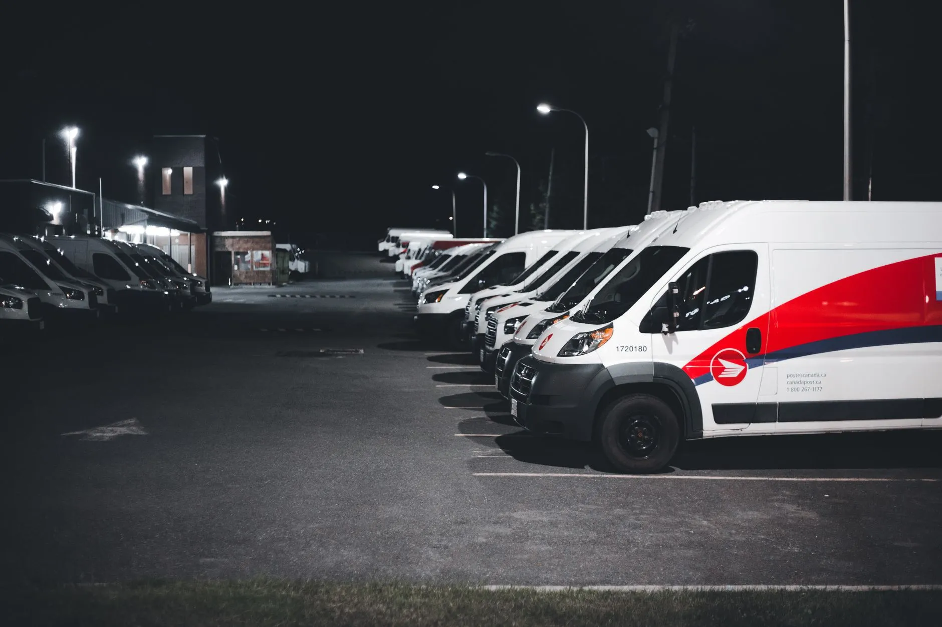 HVAC service van fleet parked in commercial lot representing Section 179 deductible assets