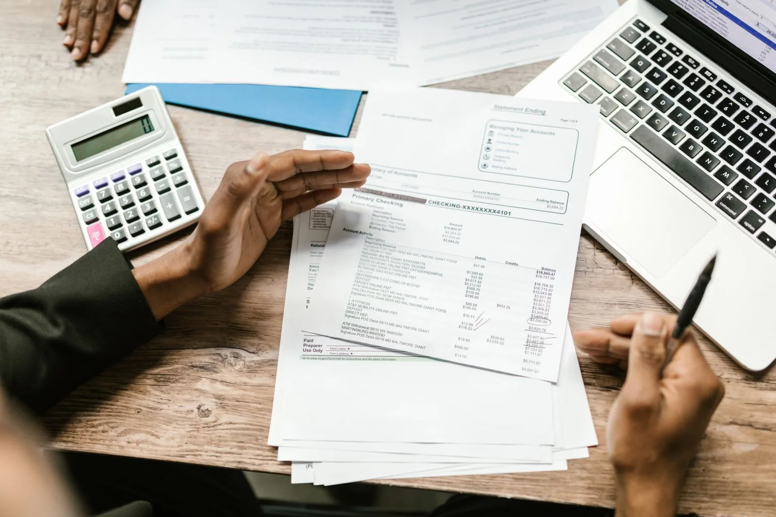 Accountant reviewing tax clearance documents